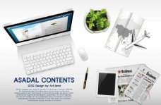 台式电脑报纸书本和盆栽