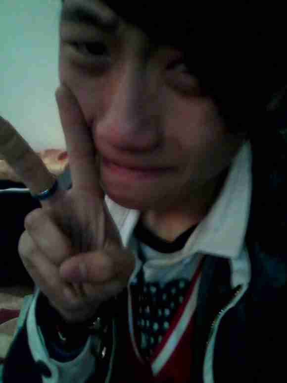 也要抽出着脸部表情笑着哭