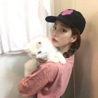 抱猫头像侧面女