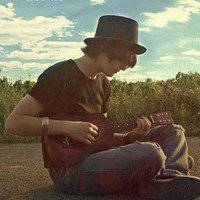 吉他头像男背影