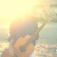 吉他头像男背影